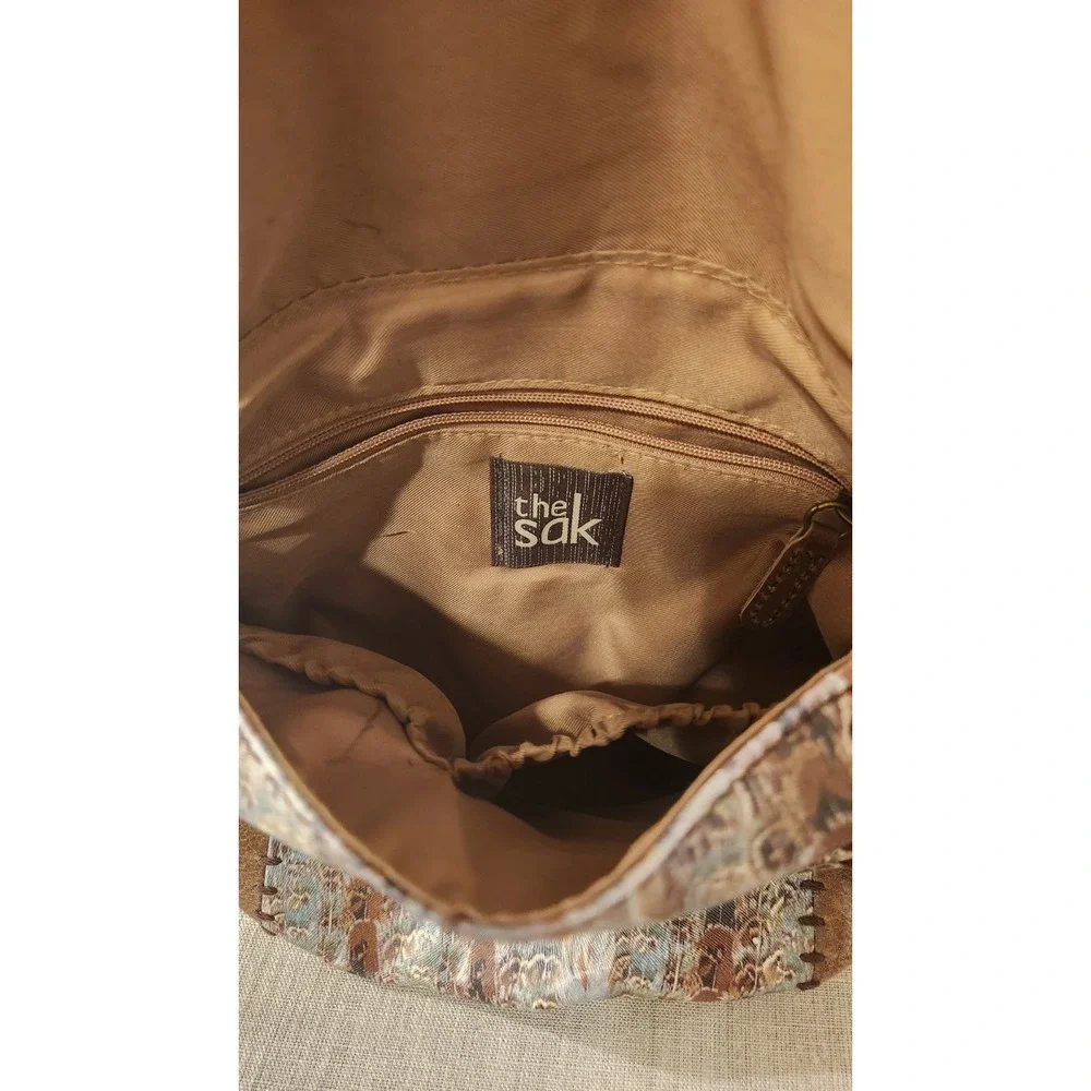 The Sak Deena Flap Foldover Brown Leather Crossbody Bag with Studs Feather Print